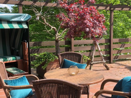 Dachterrasse mit Strandkorb und Sitzecke Dachterrasse